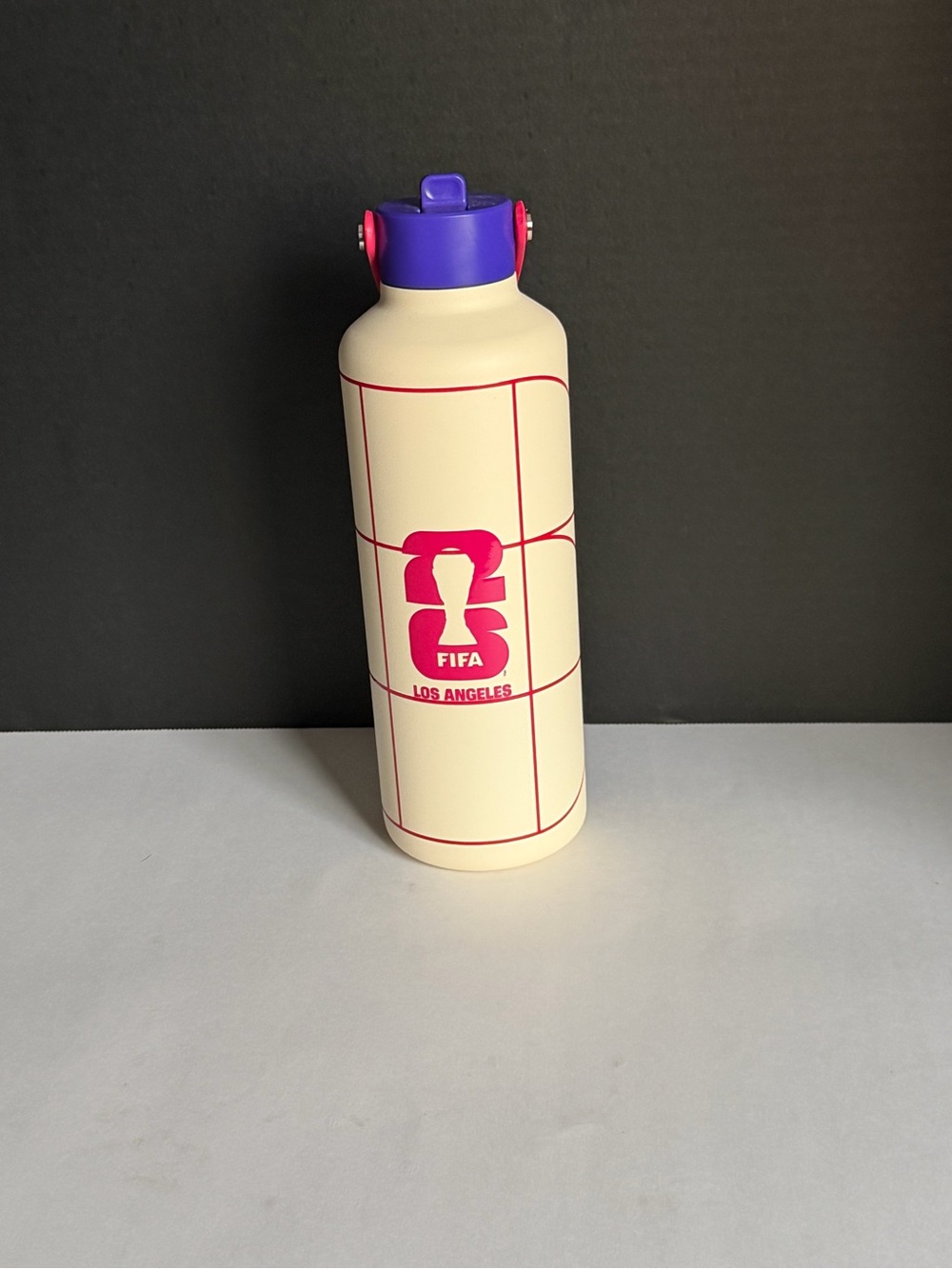 FIFA Insulated Water Bottle in Cream with Pink Accent and Purple Cap